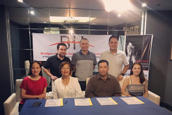 bridges of hope contract signing copy 600x400